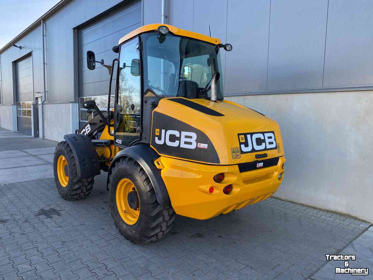 Wheelloader JCB JCB 409, giekvering, snelgang