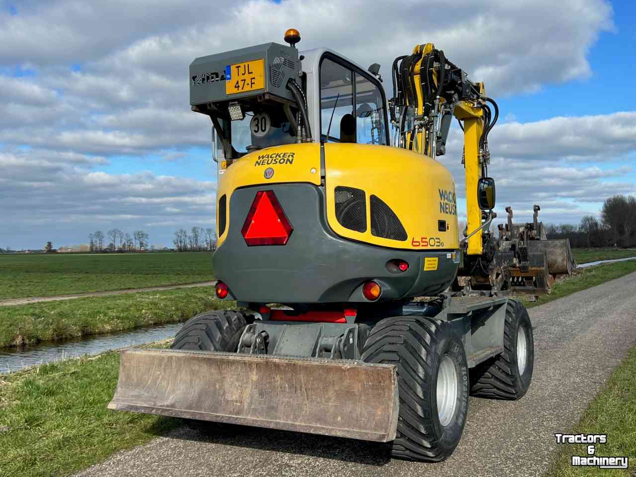 Excavator mobile Neuson 6503 wielkraan mobiel, zeer compleet, 7750 uur, BJ2013, kantelstuk en 4 bakken