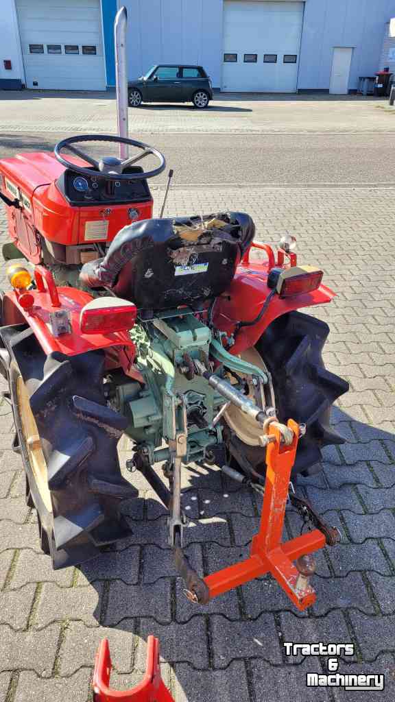 Horticultural Tractors Yanmar YM1401 met ploeg en frees.