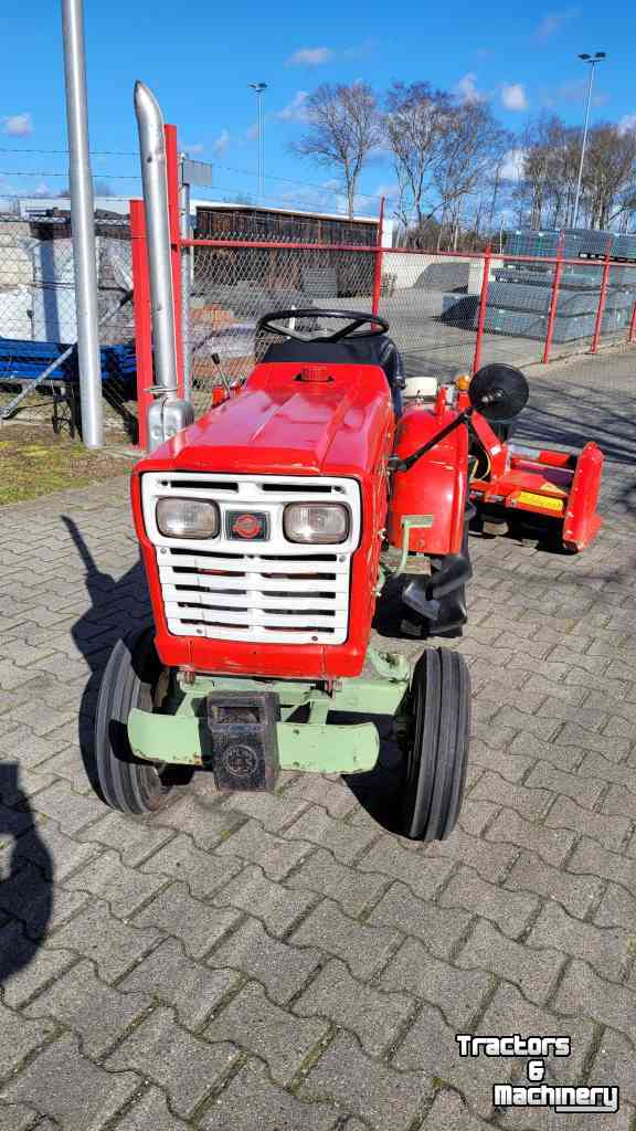 Horticultural Tractors Yanmar YM1401 met ploeg en frees.