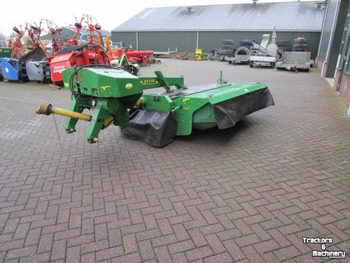 Mower John Deere 328A Schijvenmaaier + Kneuzer