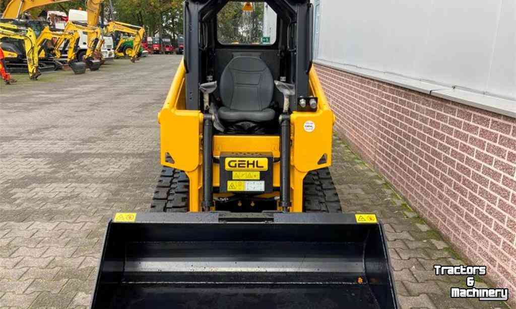 Skidsteer Gehl RT105 Schranklader op Rupsbanden