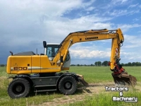 Excavator mobile Liebherr A900c met draaikantelstuk