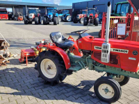 Horticultural Tractors Yanmar YM1401 met ploeg en frees.