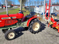 Horticultural Tractors Yanmar YM1401 met ploeg en frees.