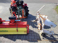 Horticultural Tractors Yanmar YM1401 met ploeg en frees.