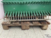 Conveyor  Transportband met vingermeenemers